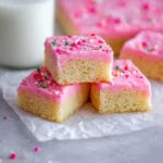 Perfectly sliced sugar cookie bars ready to enjoy